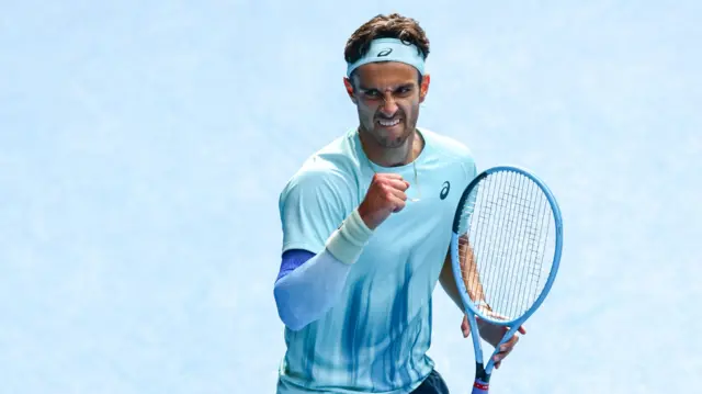 Lorenzo Musetti celebrates