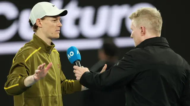 Jannik Sinner interviewed on court