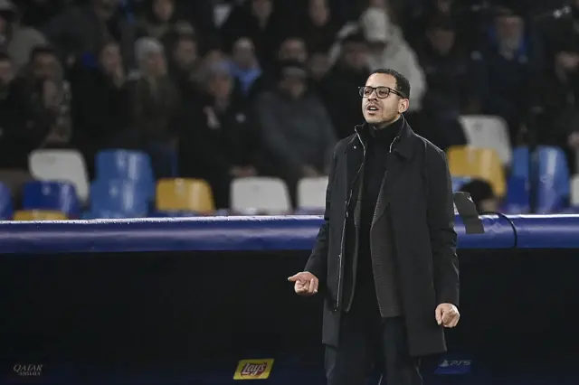 Liam Rosenior, head coach of Chelsea, follows the game