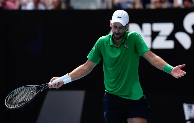 Novak Djokovic reacts