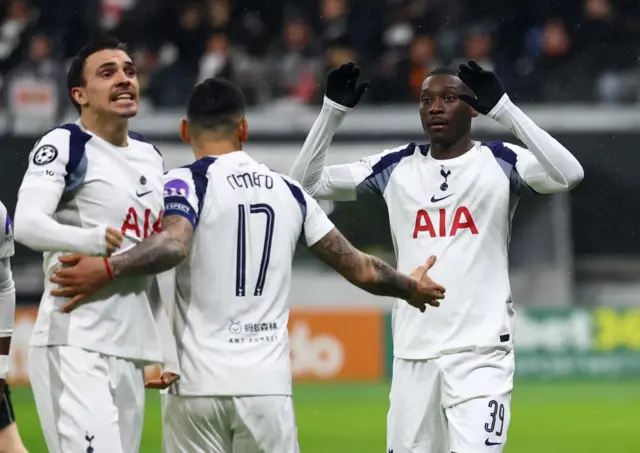 Tottenham Hotspur's Randal Kolo Muani celebrates scoring their first goal with Joao Palhinha and Cristian Romero