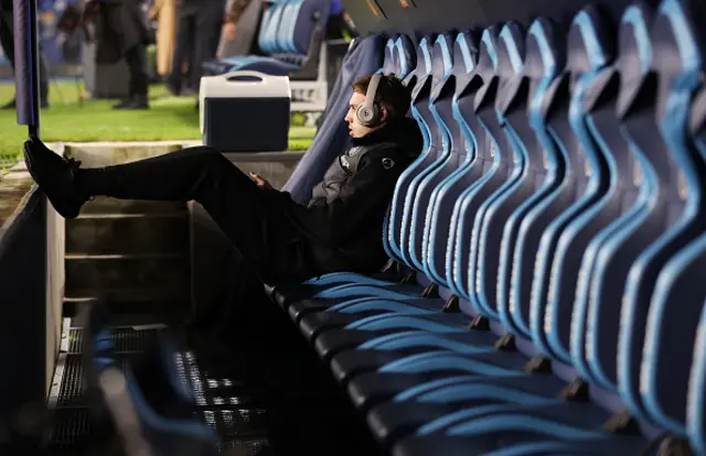 Cole Palmer of Chelsea sits in the dugout