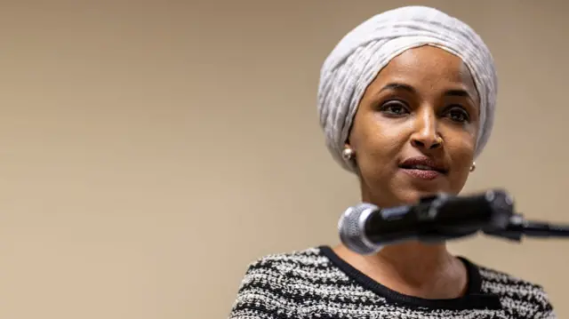 Representative Ilhan Omar speaks during a town hall on 27 January in Minnesota