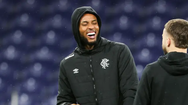 Yousseff Chermiti laughs before kick off