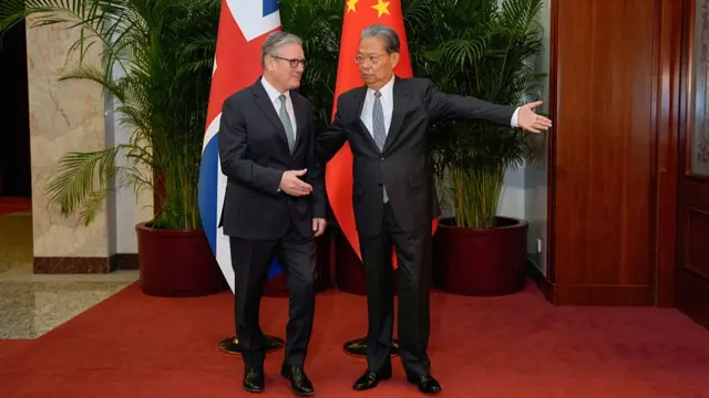 Starmer welcomed by Zhao Leji