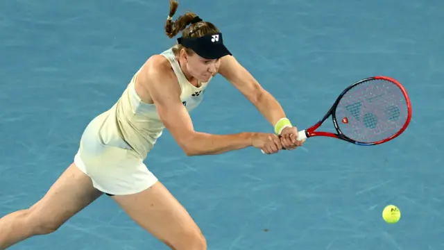 Elena Rybakina hits a backhand
