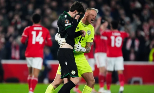 Ferencvaros' Bence Otvos is consoled by David Grof after scoring an own goal