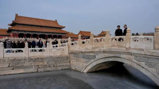Prime Minister Sir Keir Starmer (right) stands on a bridge as he's given a tour of the Forbidden City in Beijing, during his visit to China