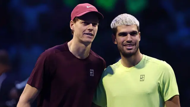 Jannik Sinner (L) and Carlos Alcaraz (R) pose for a photo at the ATP Finals