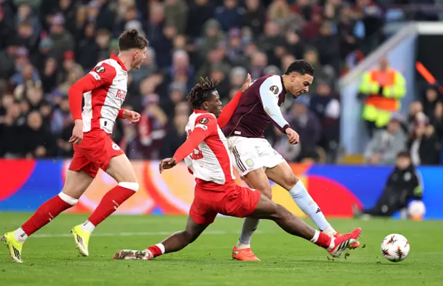 Morgan Rogers of Aston Villa scores