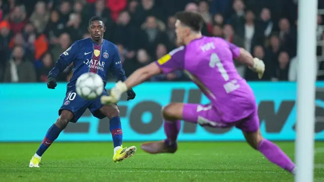 Ousmane Dembele takes a shot