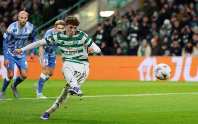Celtic's Arne Engels scores their third goal from the penalty spot