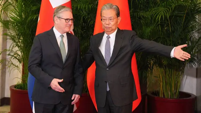 Zhao Leji (R), Chairman of the Standing Committee of China's National People's Congress