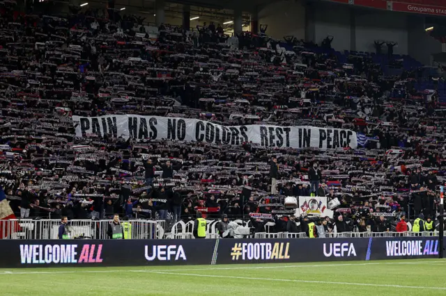 Pain has no colours, rest in peace banner in the home end