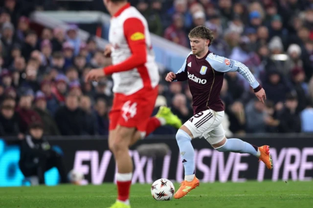 Harvey Elliott of Aston Villa (R) in action