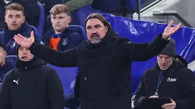 Daniel Farke gestures with his arms out wide