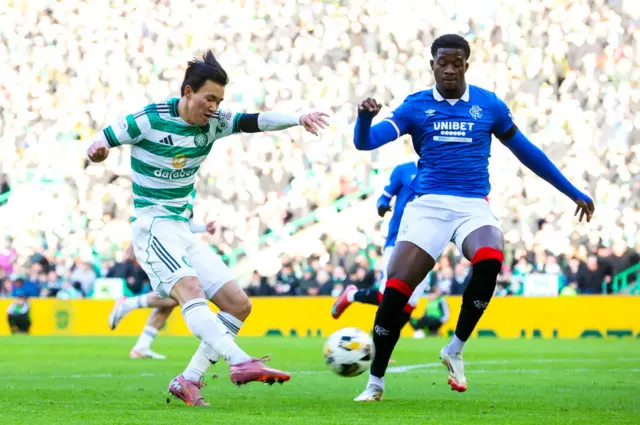 Celtic's Yang Hyun-jun (left) scores