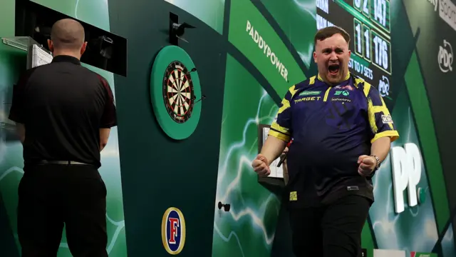 Luke Littler celebrates