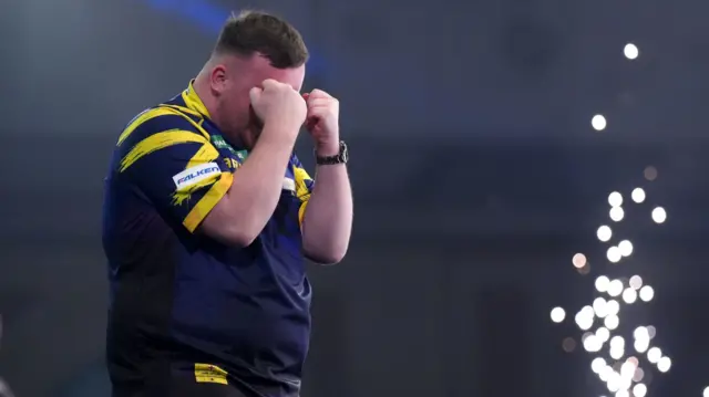 Luke Littler celebrates