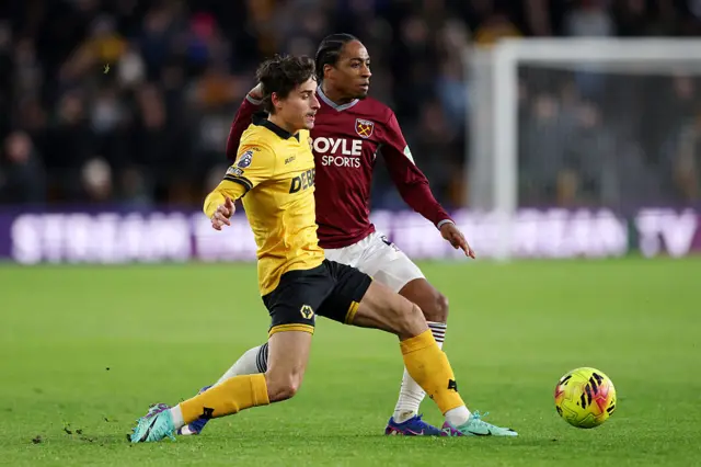 Kyle Walker-Peters of West Ham United and Hugo Bueno