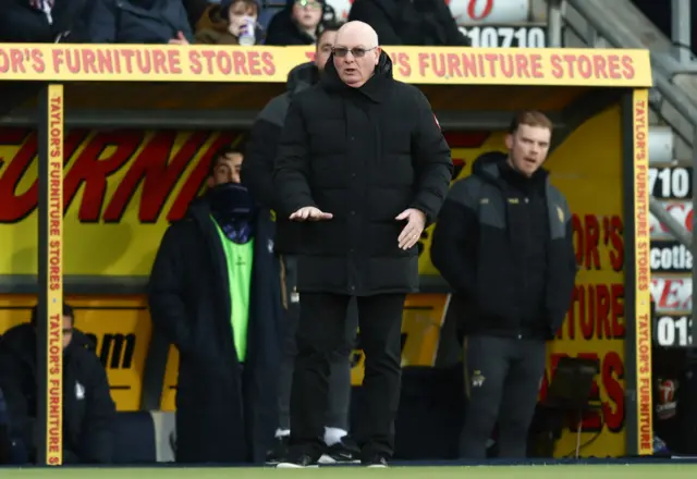 John McGlynn watches on as his side enjoy the play