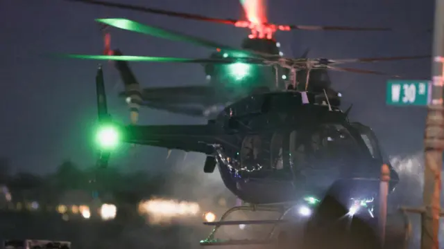 One of three helicopters believed to be carrying Venezuela's President Nicolas Maduro and his wife Cilia Flores arrives in Manhattan.