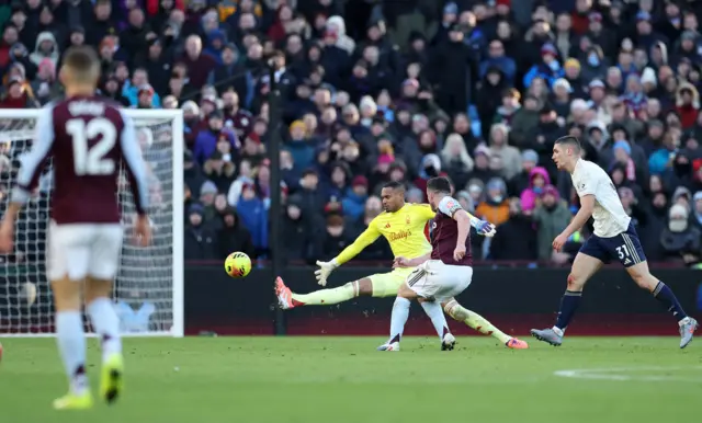 Aston Villa's John McGinn scores their third goal