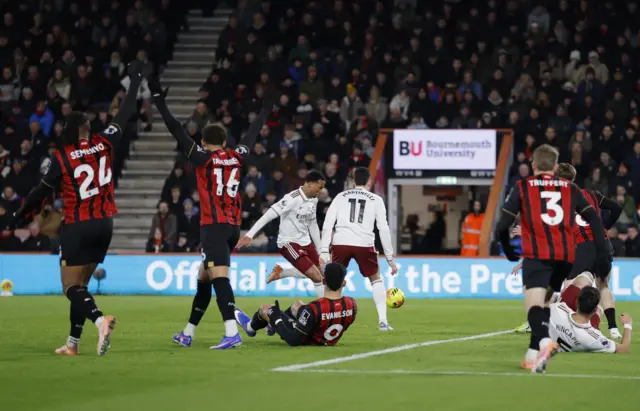 Arsenal's Gabriel Magalhaes scores their first goal