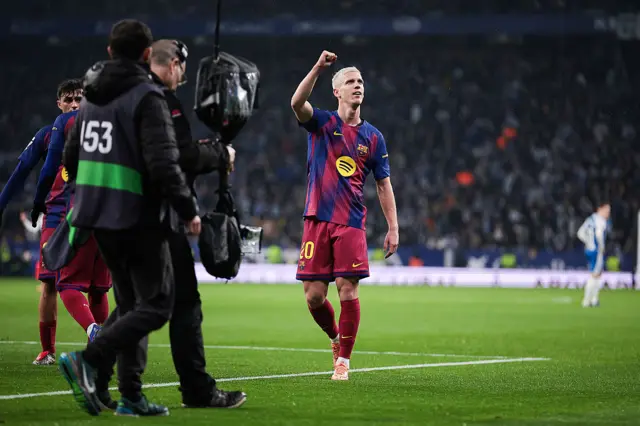 Dani Olmo of FC Barcelona celebrates with his teammates after scoring the team's first goal during the LaLiga EA Sports match between RCD Espanyol de Barcelona and FC Barcelona at RCDE Stadium on January 03, 2026 in Barcelona, Spain.
