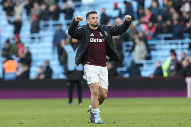 Aston Villa's Scottish midfielder #07 John McGinn celebrates
