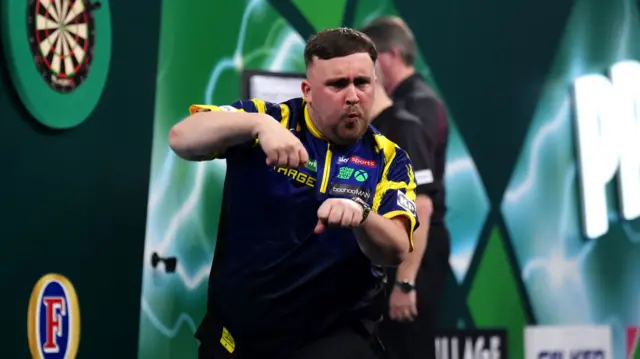 Luke Littler celebrates a 170 checkout