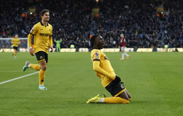 Wolverhampton Wanderers' Mateus Mane (left) scores their side's third goal