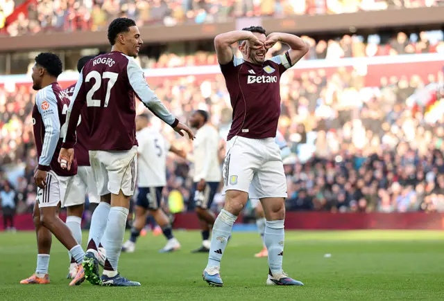 John McGinn of Aston Villa celebrates scoring his team's second goal
