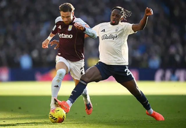 Matty Cash of Aston Villa is challenged by Dilane Bakwa of Nottingham Forest during the Premier League match between Aston Villa and Nottingham Forest at Villa Park on January 03, 2026 in Birmingham, England.