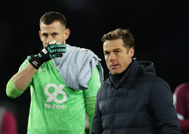 Burnley manager Scott Parker and Martin Dubravka look dejected after the match