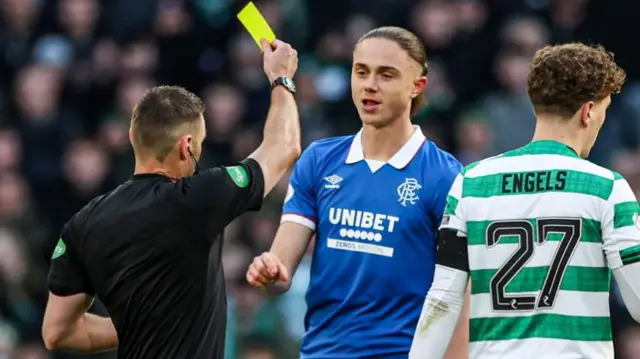 Thelo Aasgaard shown a yellow card