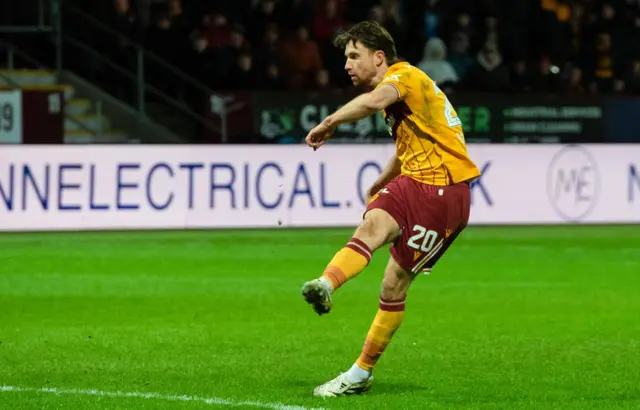 Motherwell's Elliot Watt scores