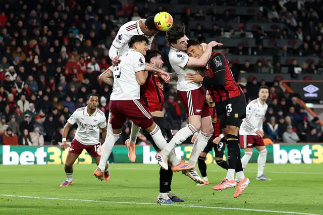 Gabriel of Arsenal heads the ball clear