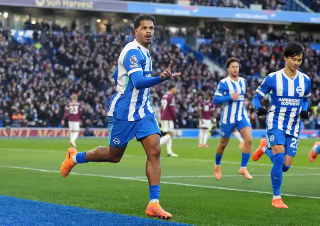 Brighton and Hove Albion's Georginio Rutter celebrates scoring their side's first goal.