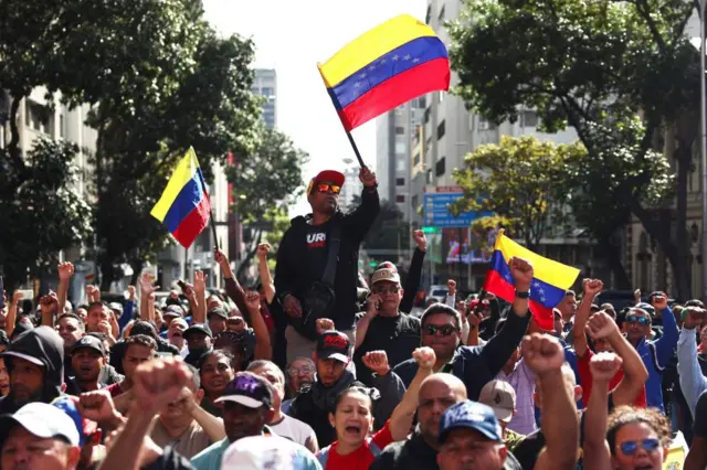 Government supporters stage a rally near the Mireflores Palace demanding the 'return' of Venezuelan President Nicolas Maduro, Caracas, Venezuela, 03 January 2026