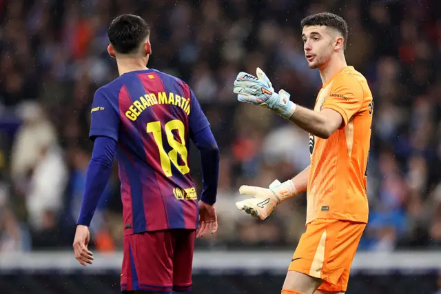 Joan Garcia and Gerard Martin of FC Barcelona