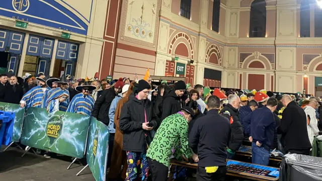 Fans queue to get in to Alexandra Palace