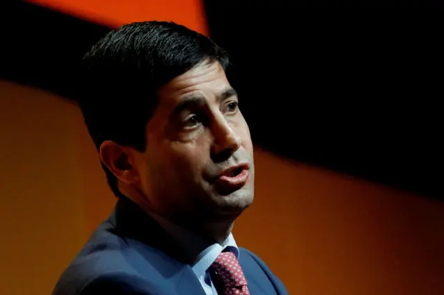 Close up of former Fed governor Kevin Warsh mid speech