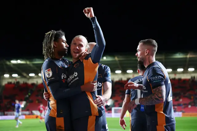 Lars Jorgen Salvesen of Derby County celebrates with team-mates after scoring