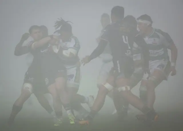Players in thick mist