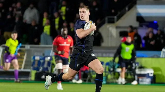 Dan Lancaster of Glasgow Warriors runs in to score a try