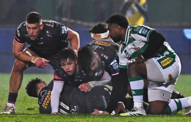 Scarlets protect the ball at a ruck against Benetton