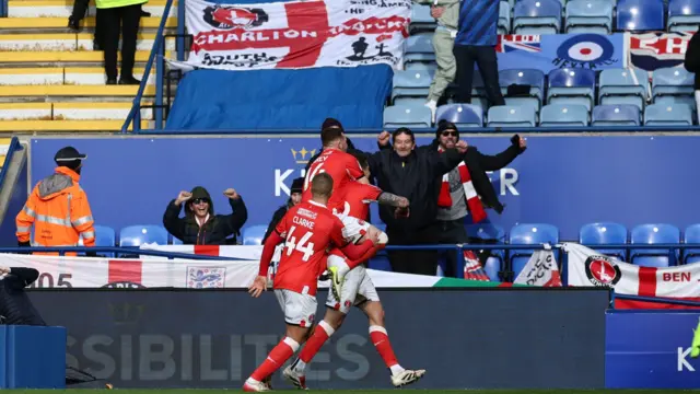 Lyndon Dykes celebrates in front of the Charlton fans
