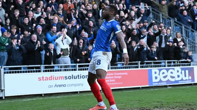 Ebou Adams salutes the Fratton Park crowd