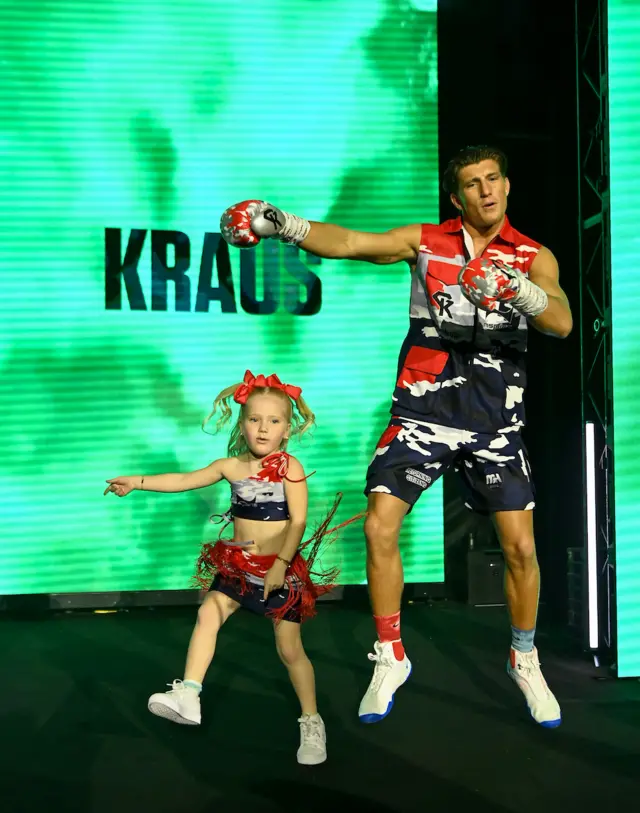 Gradus Kraus dances with his daughter